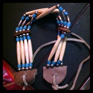 Native made wood choker necklace with a torqouise